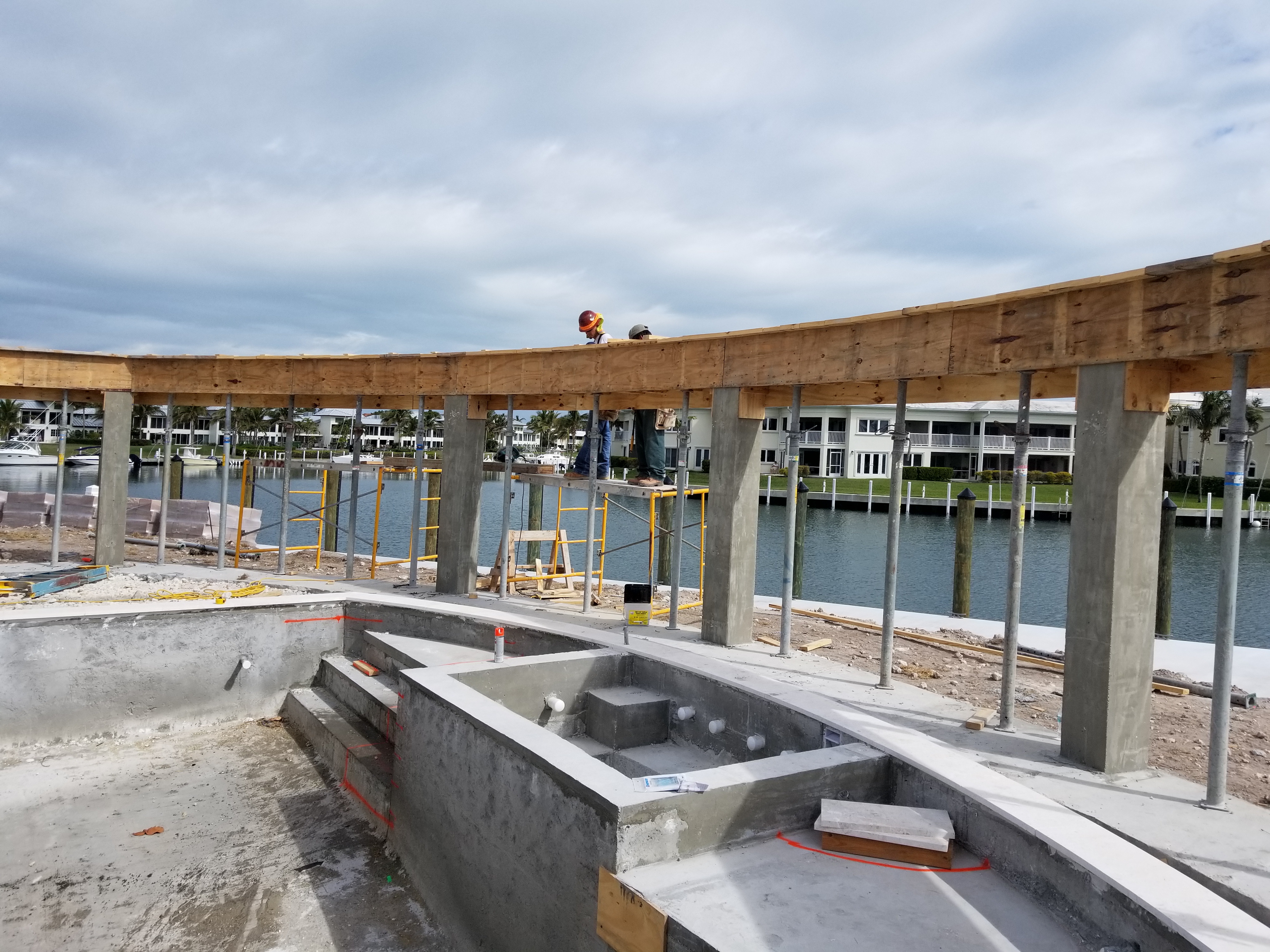 Integrated pool and pergola construction in progress